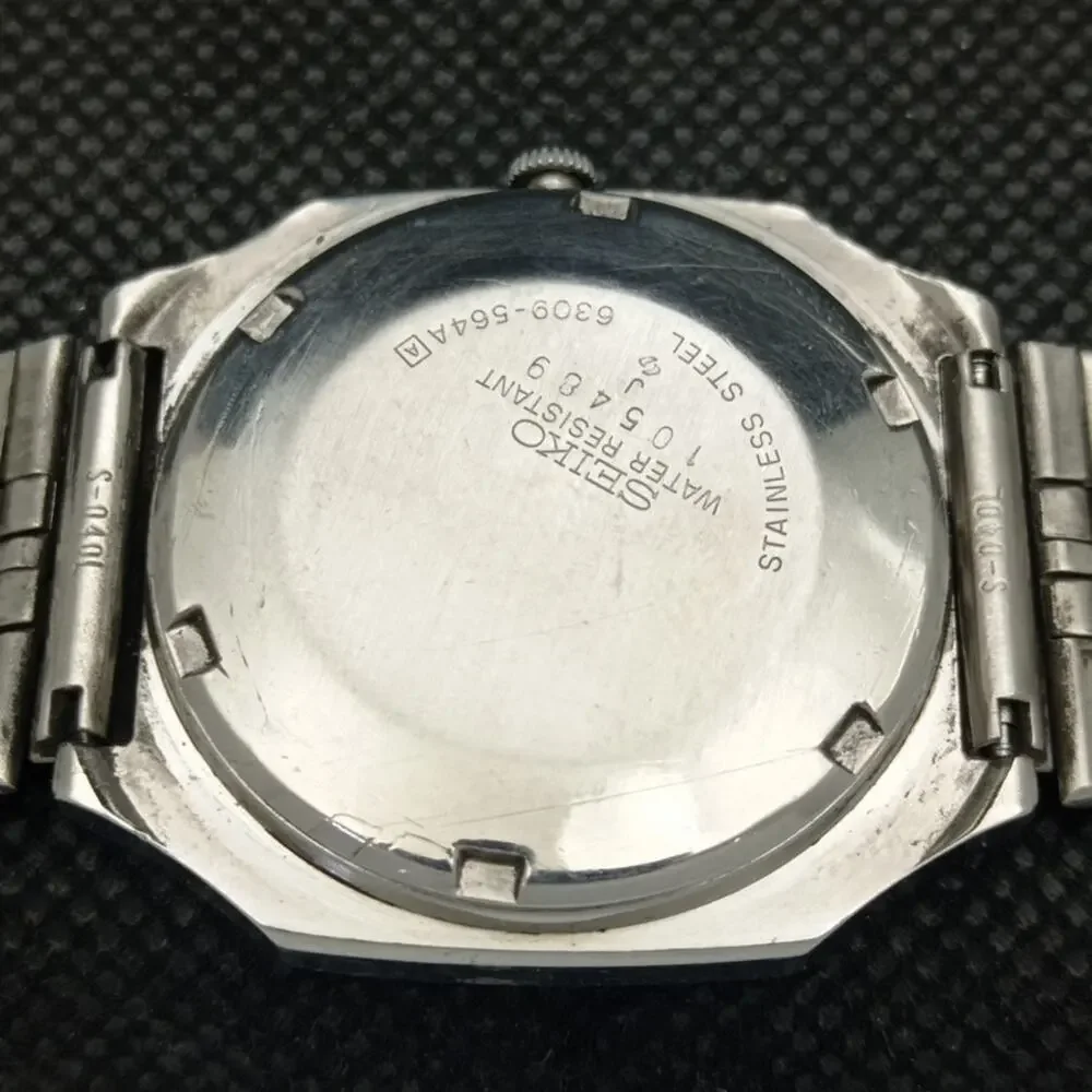 Vintage 1980 Seiko Automatic Mens Silver Watch W/daydate & White accents